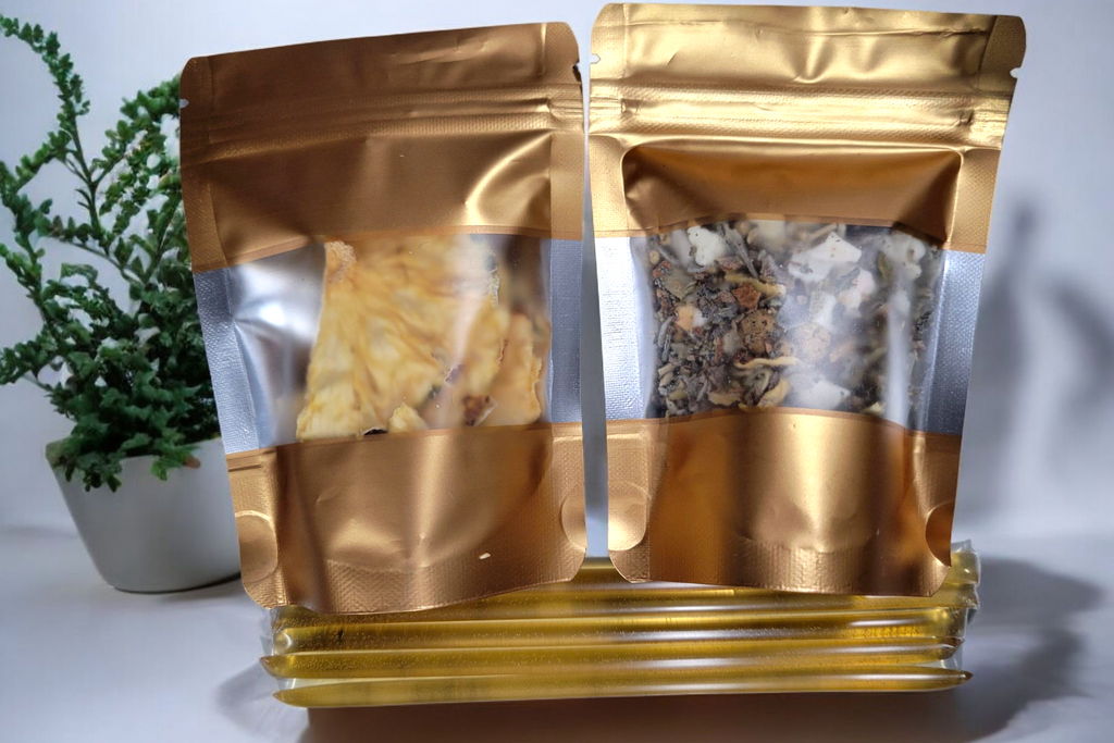 Gold foil packaging with clear window on a white background